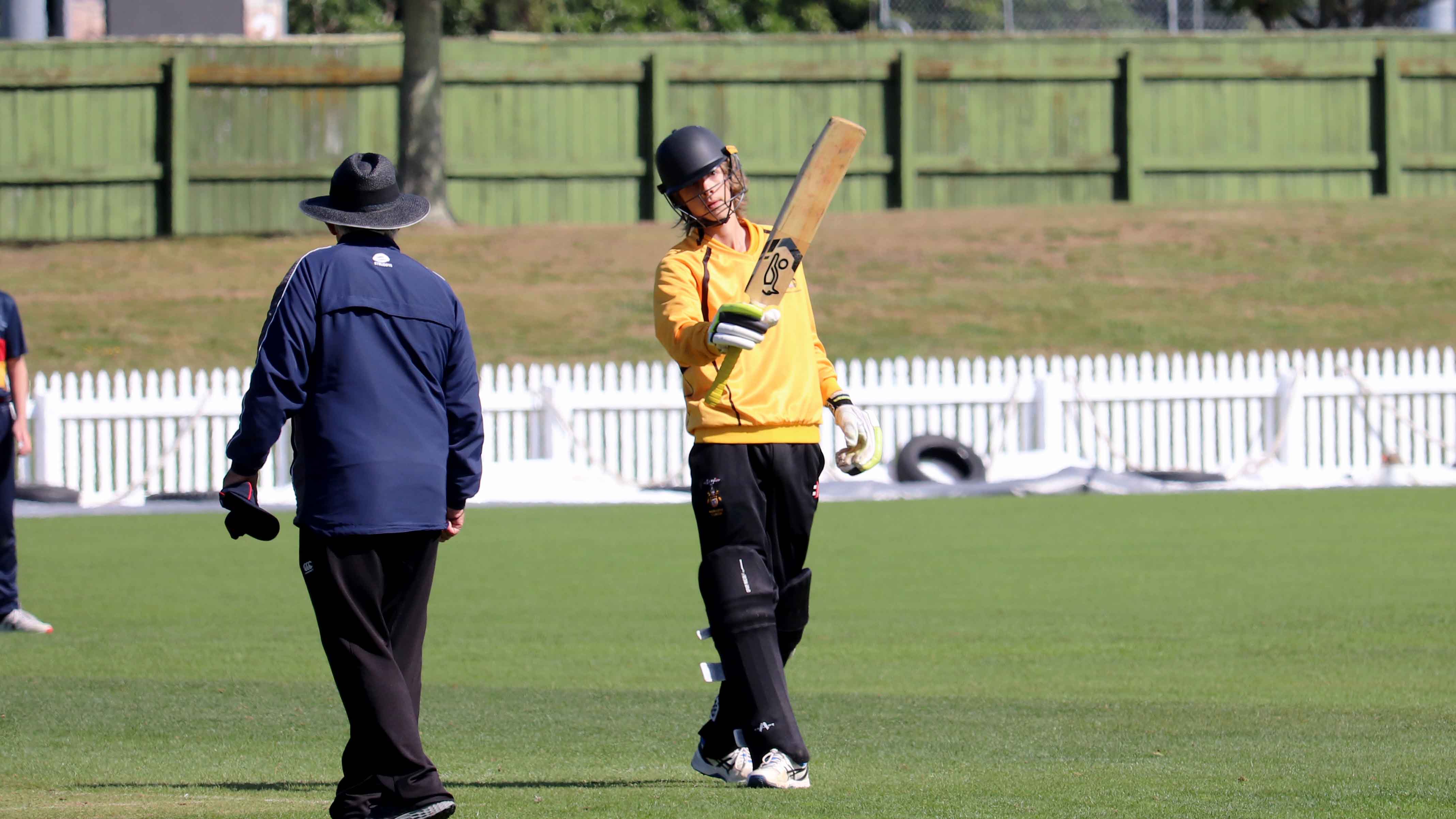 Oscar Dry (Wellington College) raises his bat for a well made half-century - NZC